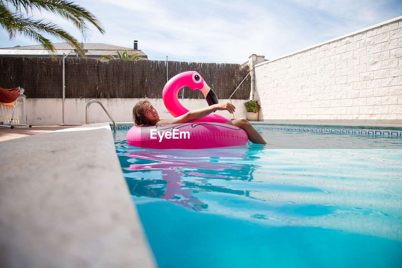 PEOPLE ON SWIMMING POOL