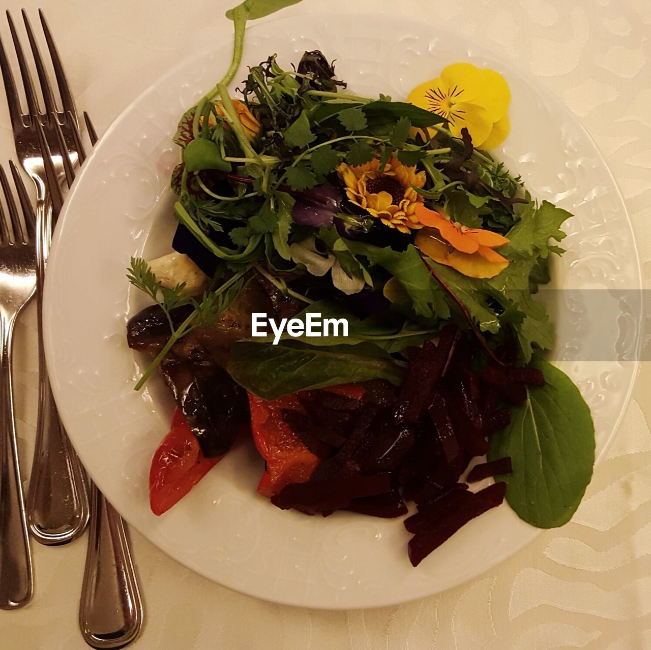 Directly above shot of salad served in plate on table