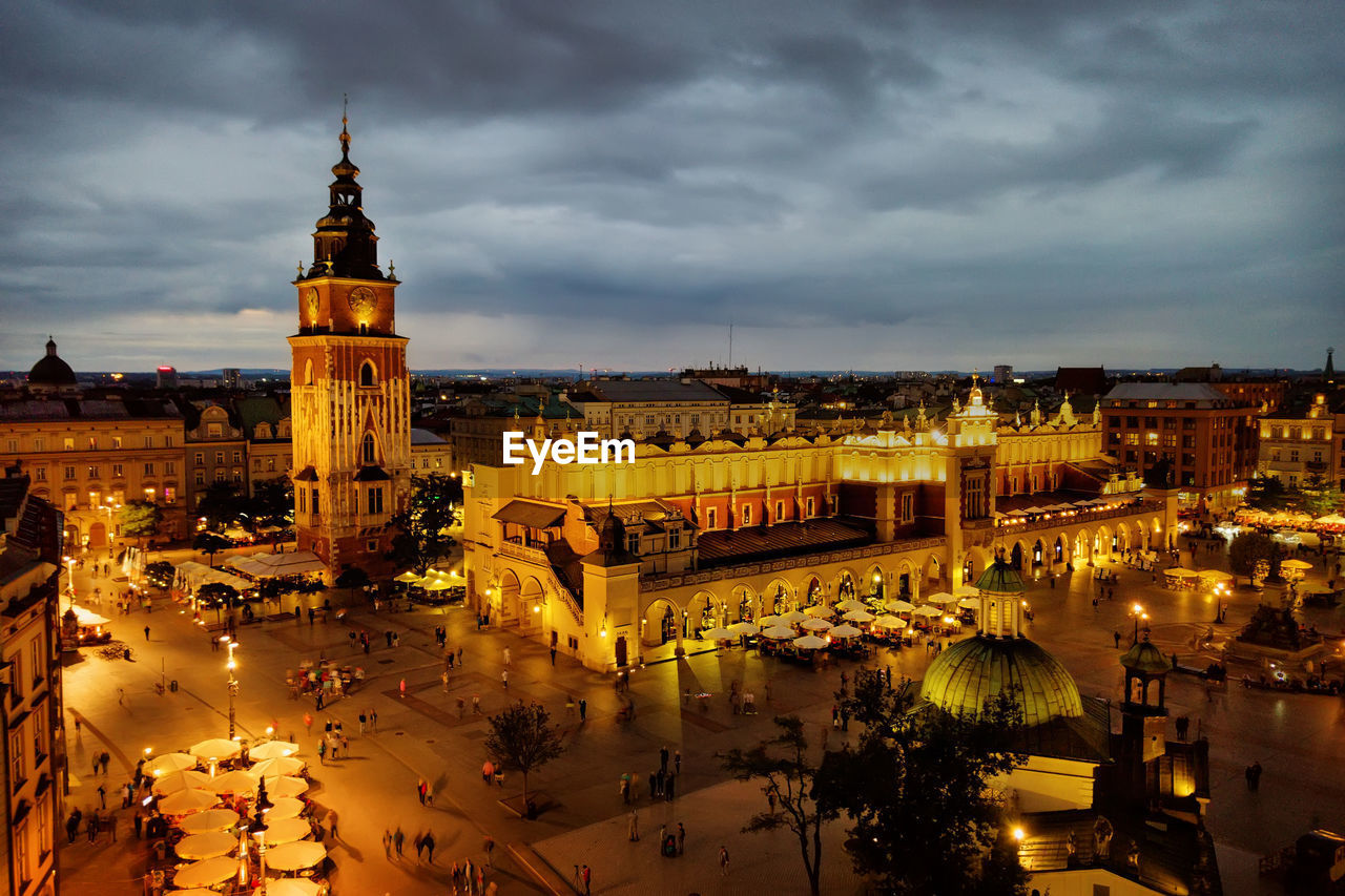 High angle view of illuminated buildings against sky