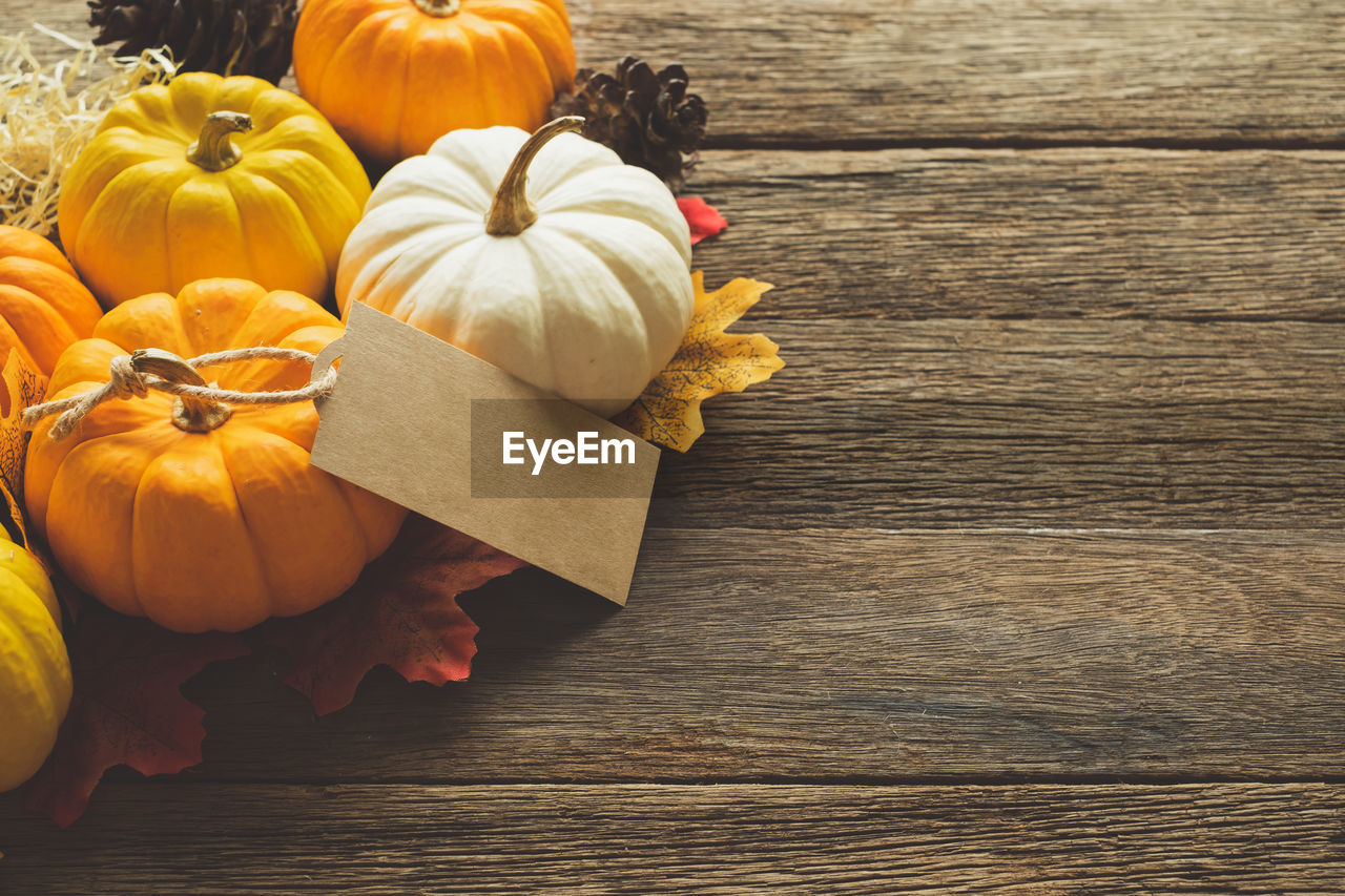 High angle view of pumpkins on table during autumn