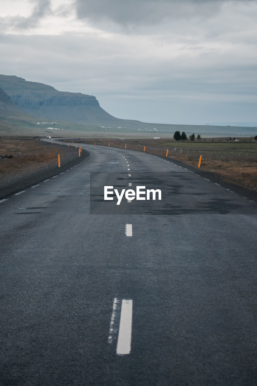 Empty road against sky