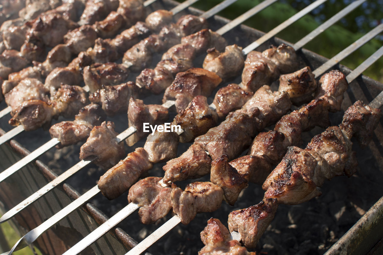 Close-up of meat on barbecue grill