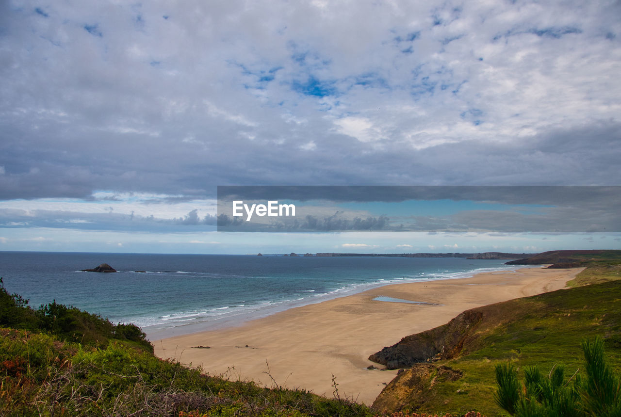 VIEW OF BEACH AGAINST SKY