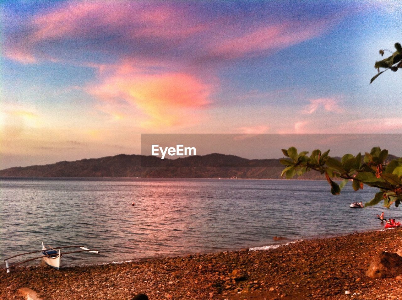 SCENIC VIEW OF SEA DURING SUNSET