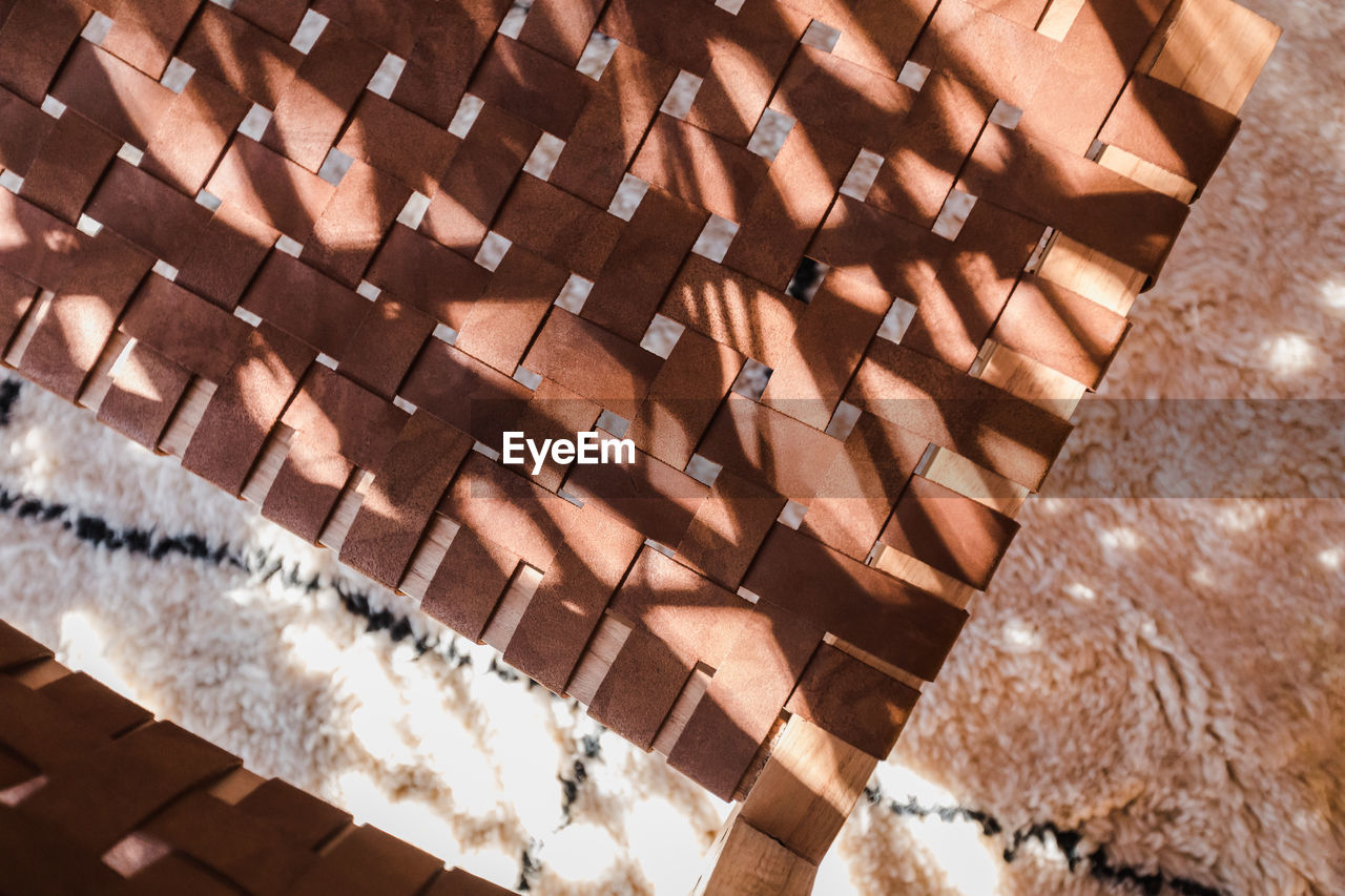 High angle view of sunlight falling on rooftop