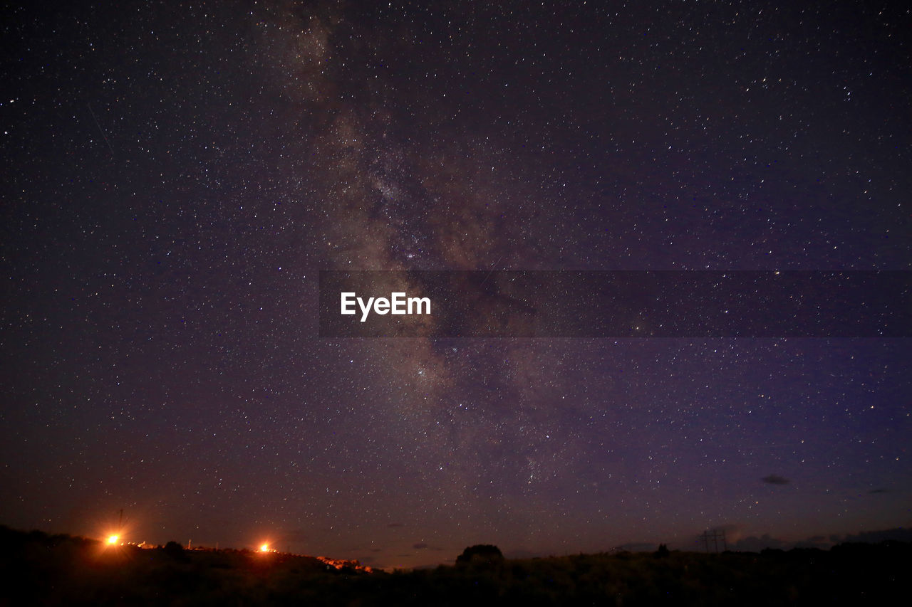 Low angle view of stars against sky at night