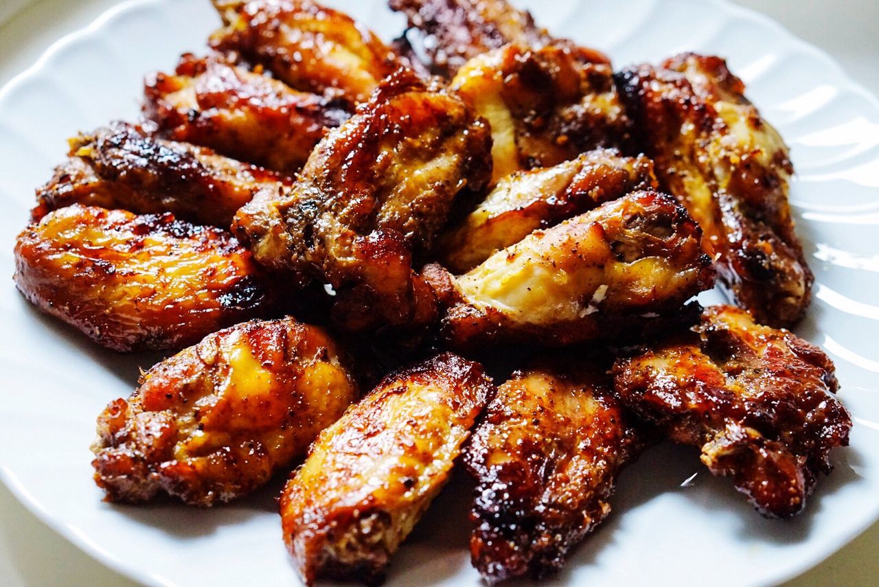 CLOSE-UP OF MEAT ON BARBECUE