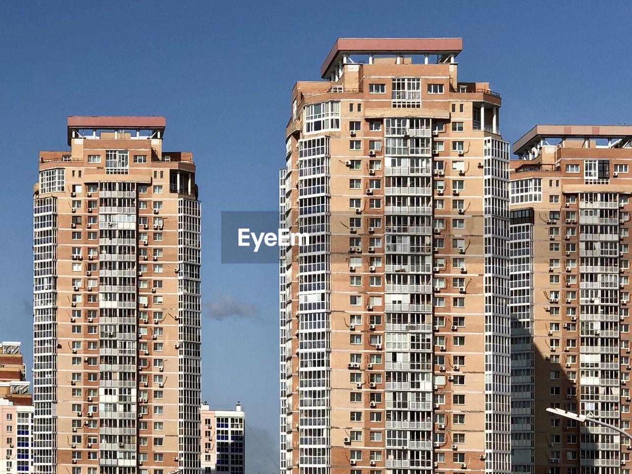 Low angle view of buildings against clear sky