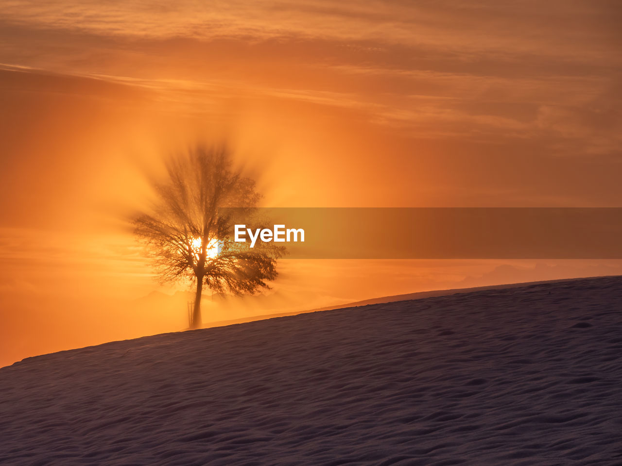 SCENIC VIEW OF SILHOUETTE LAND AGAINST SKY DURING SUNSET