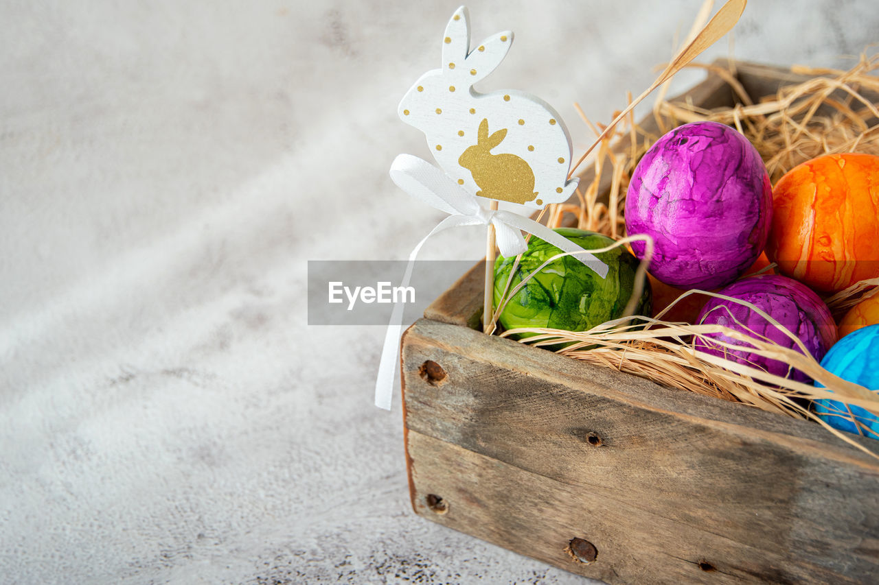 food, food and drink, easter, easter egg, no people, multi colored, still life, egg, freshness, container, basket, vegetable, wood, tradition, nature, healthy eating, indoors, celebration, high angle view, wellbeing, plant, studio shot, holiday, table