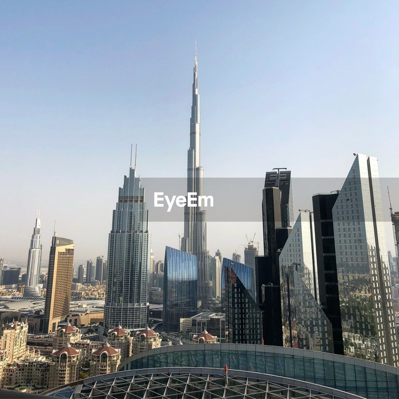 Modern buildings in city against sky