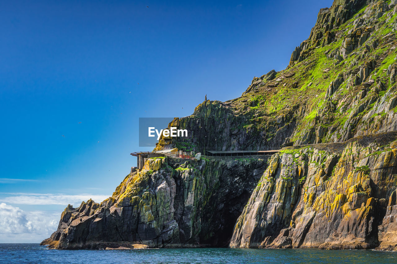 Helipad and shelter houses on skellig michael island. star wars film location, ireland