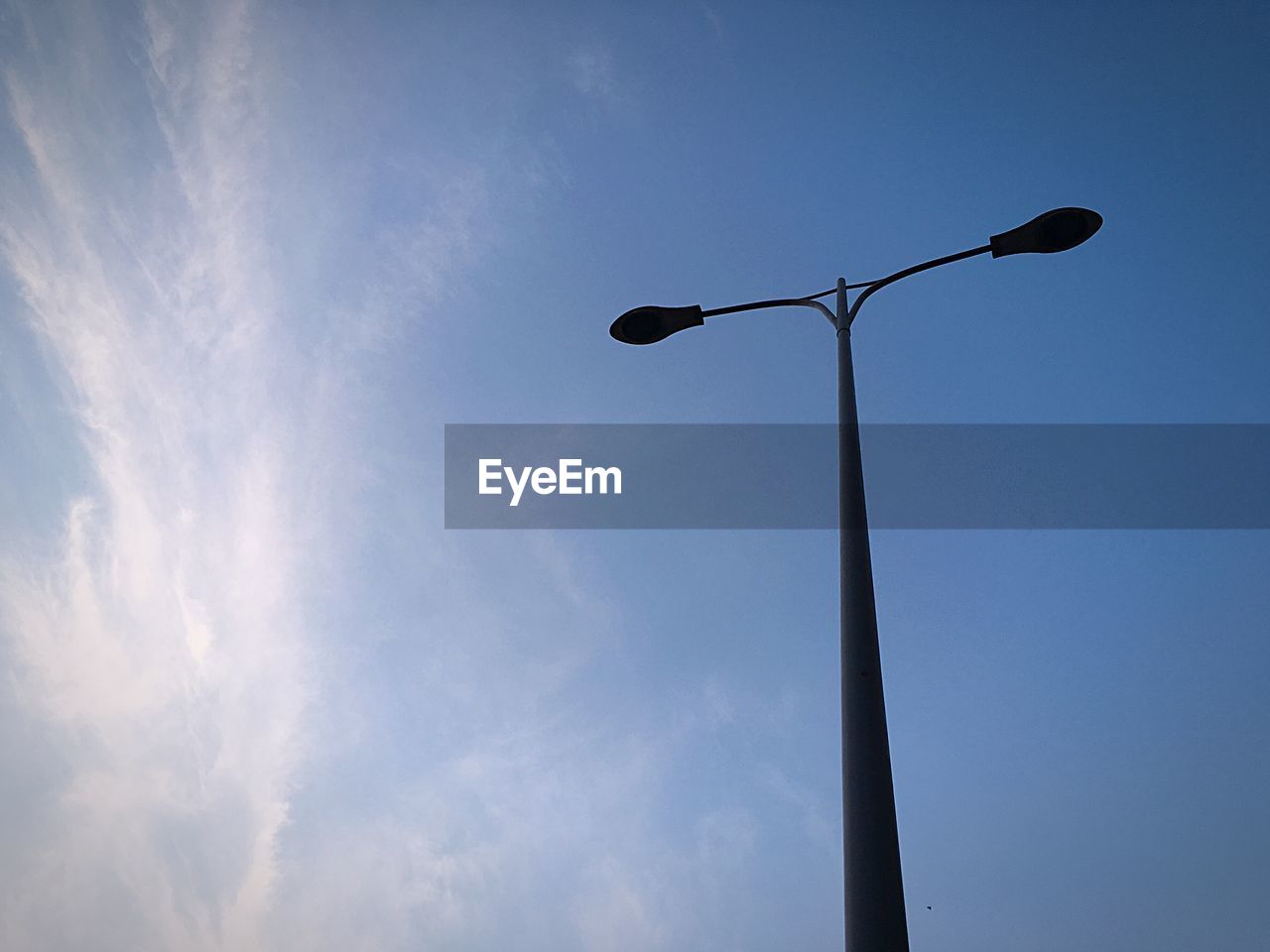 LOW ANGLE VIEW OF STREET LIGHT AGAINST SKY