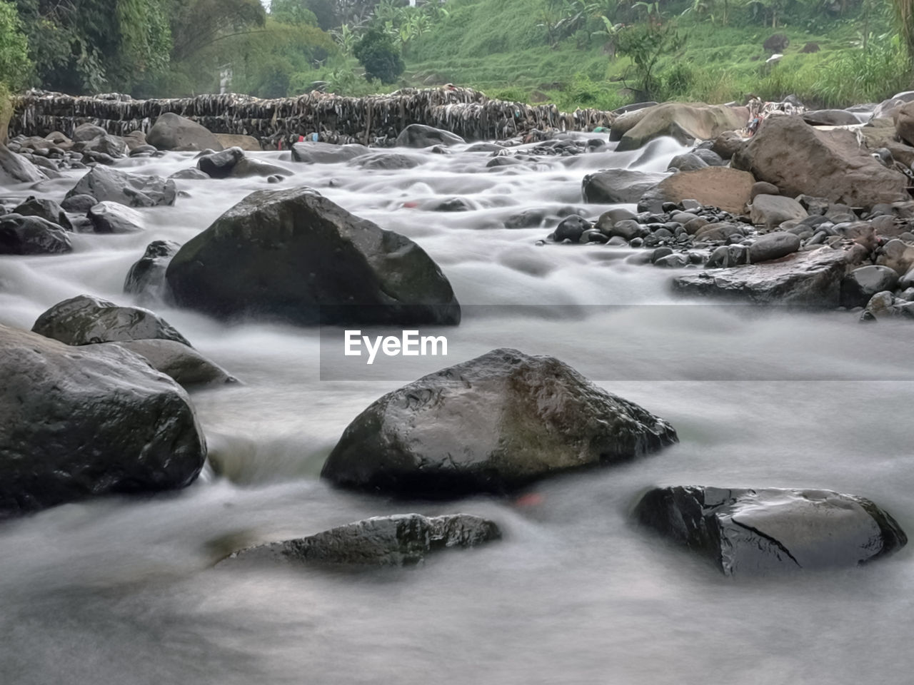 water, rapid, river, beauty in nature, body of water, rock, scenics - nature, nature, land, stream, tree, motion, environment, forest, long exposure, plant, watercourse, no people, outdoors, flowing water, non-urban scene, day, landscape, waterfall, tranquility, water feature, flowing, blurred motion, tranquil scene, idyllic