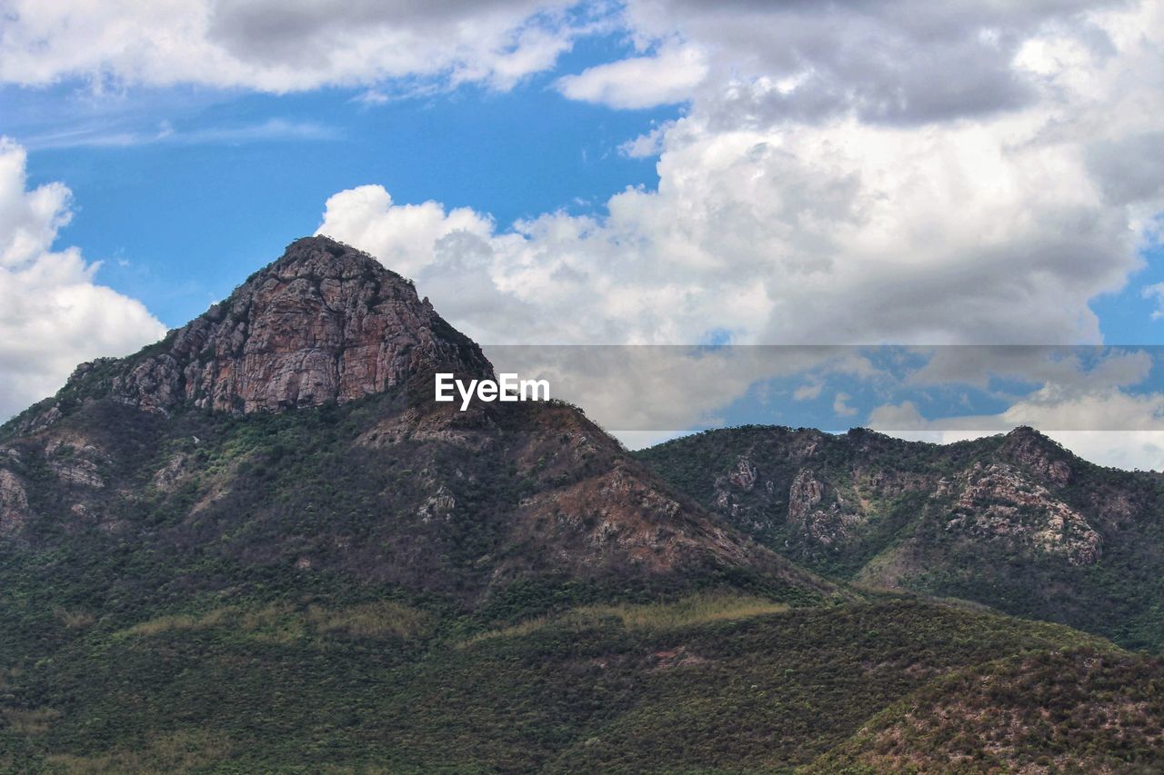 Scenic view of rocky mountains against sky