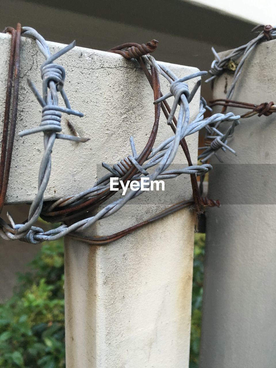 Close-up of barbed wire fence