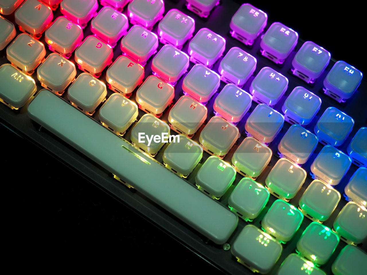 High angle view of illuminated keyboard keys