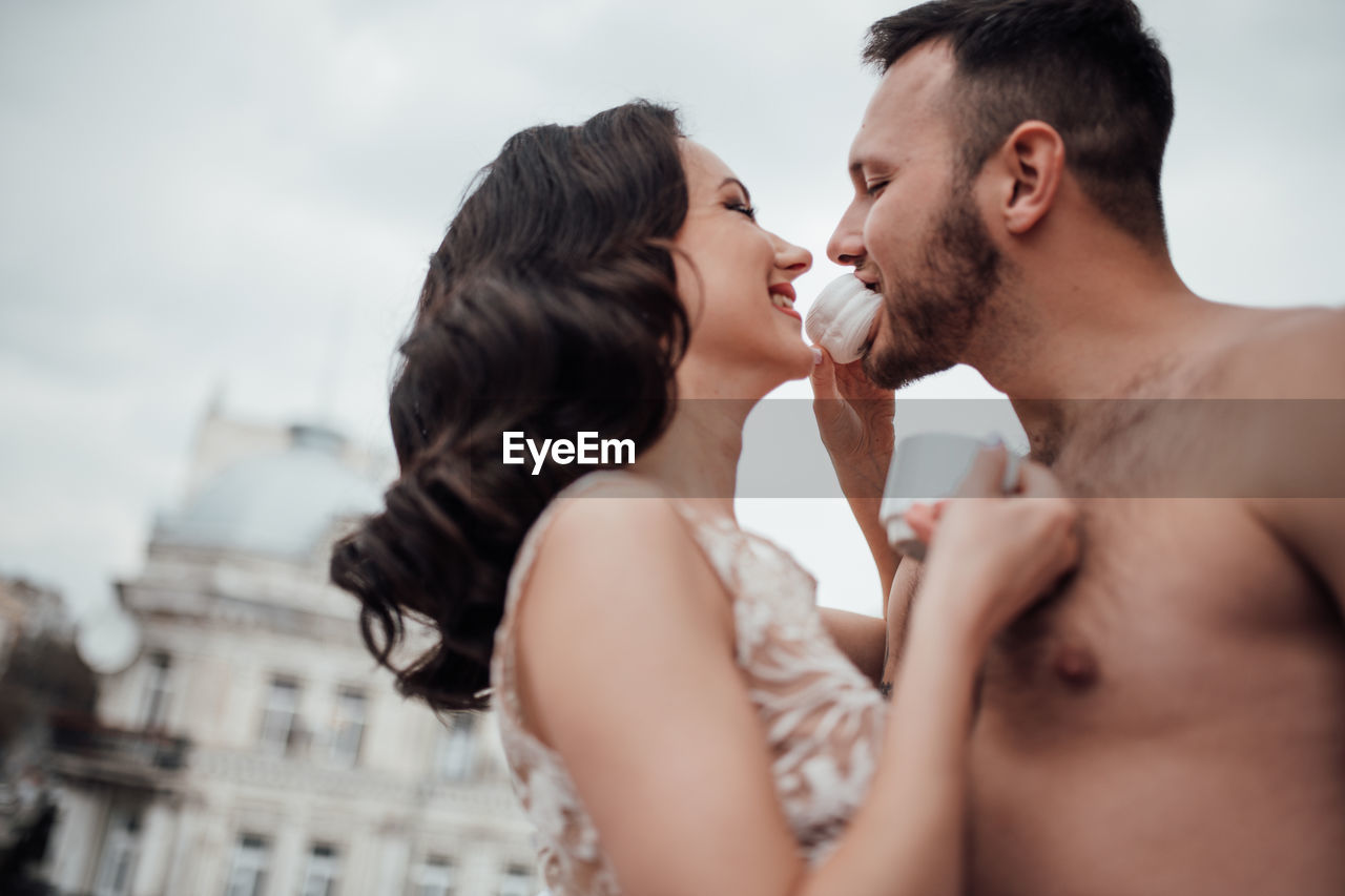 Side view of young couple