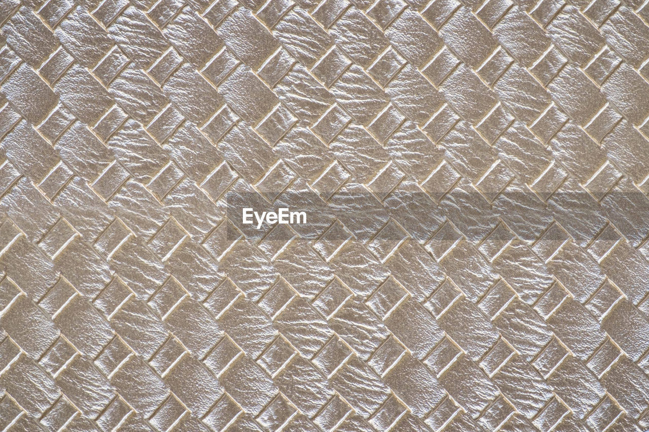 Full frame shot of woven leather background