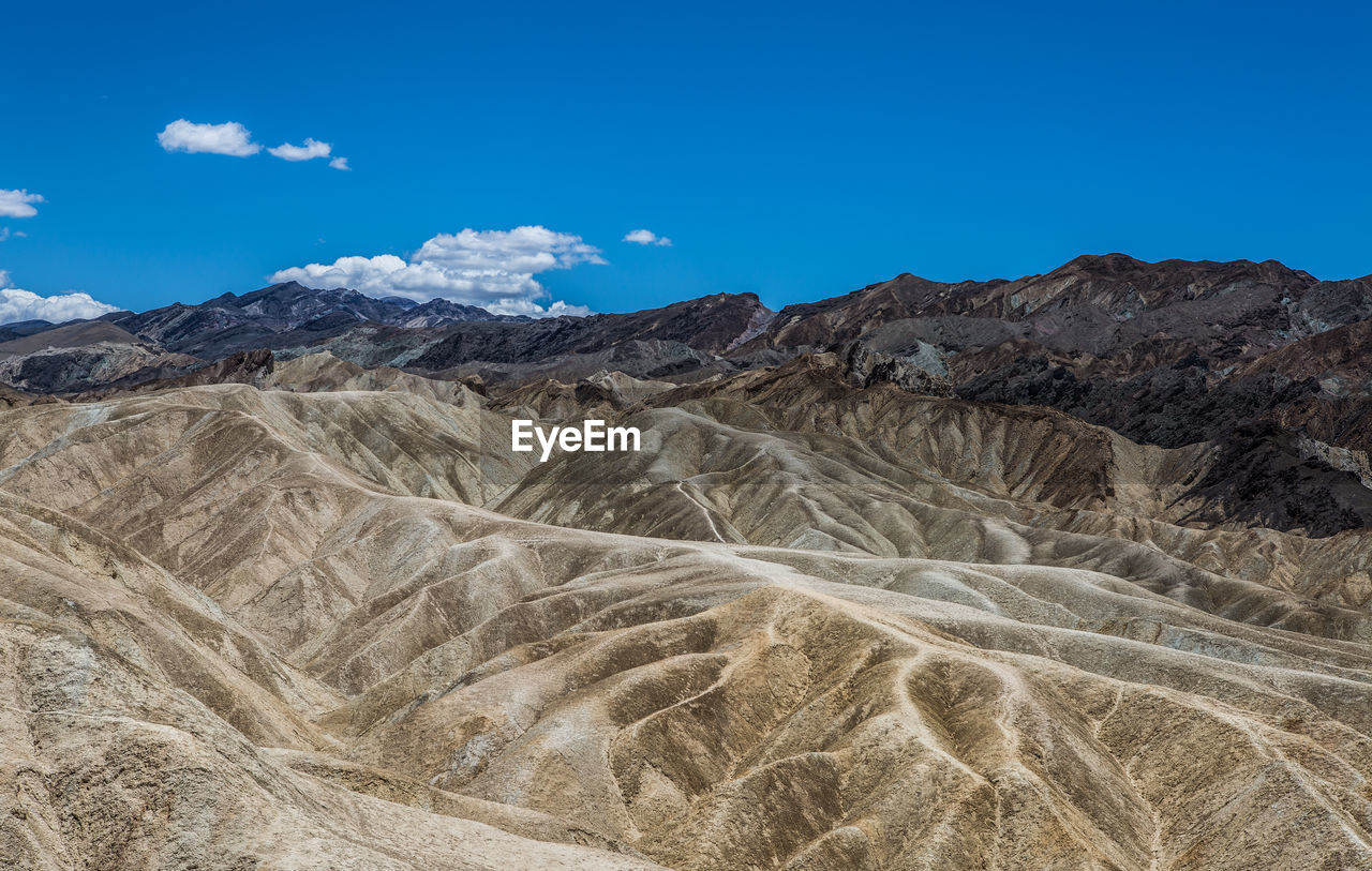 SCENIC VIEW OF LANDSCAPE AND MOUNTAINS AGAINST SKY