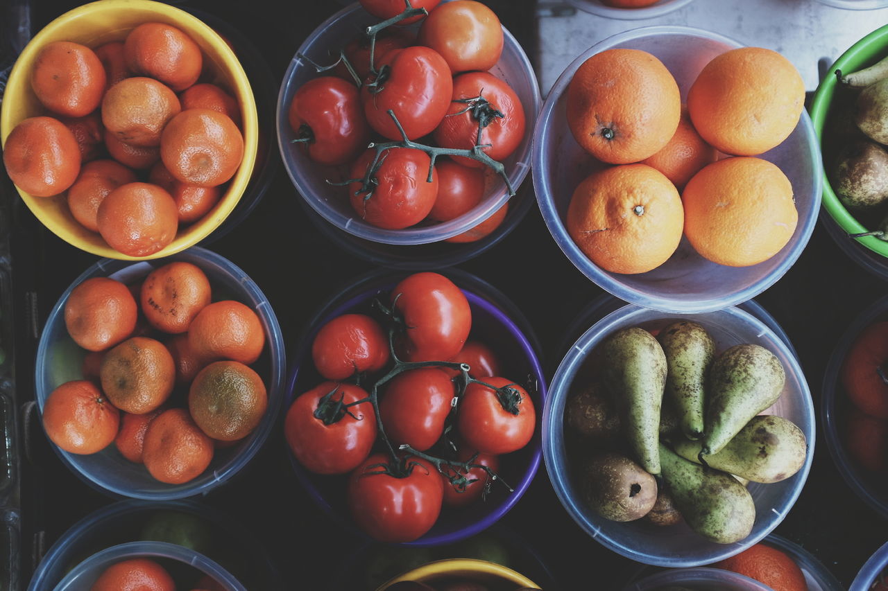 High angle view of fruits and vegetables in bowl at market