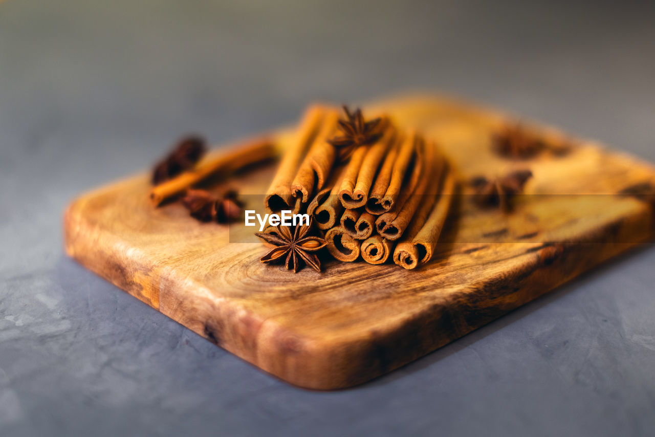 food and drink, food, indoors, macro photography, no people, close-up, studio shot, freshness, spice, wood, selective focus, still life, text, wellbeing, ingredient, table, healthy eating