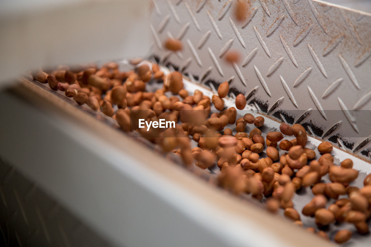 HIGH ANGLE VIEW OF COFFEE BEANS IN KITCHEN