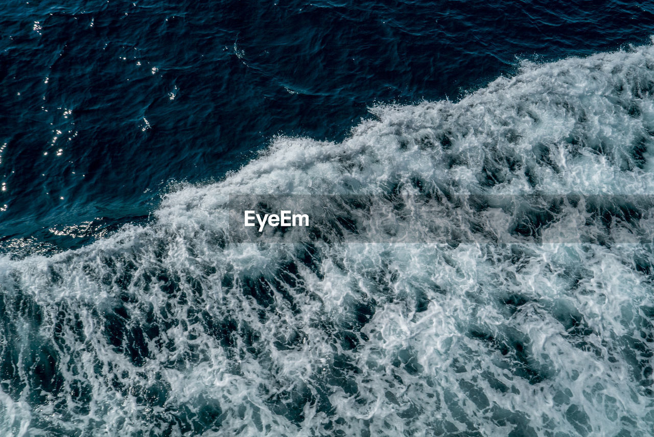 High angle view of waves in sea