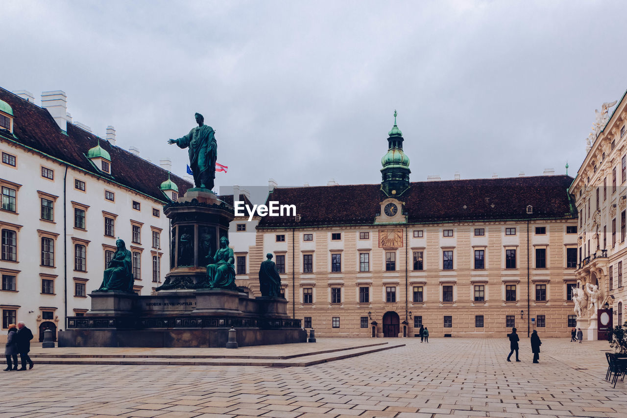 View of vienna hofburg imperial palace at courtyard with monument kaiser franz i, vienna, austria