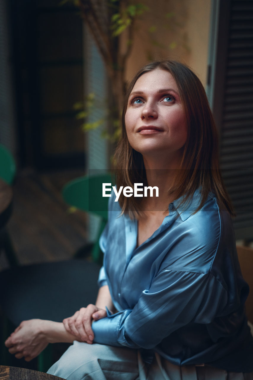 Woman portrait, in a cafe close up