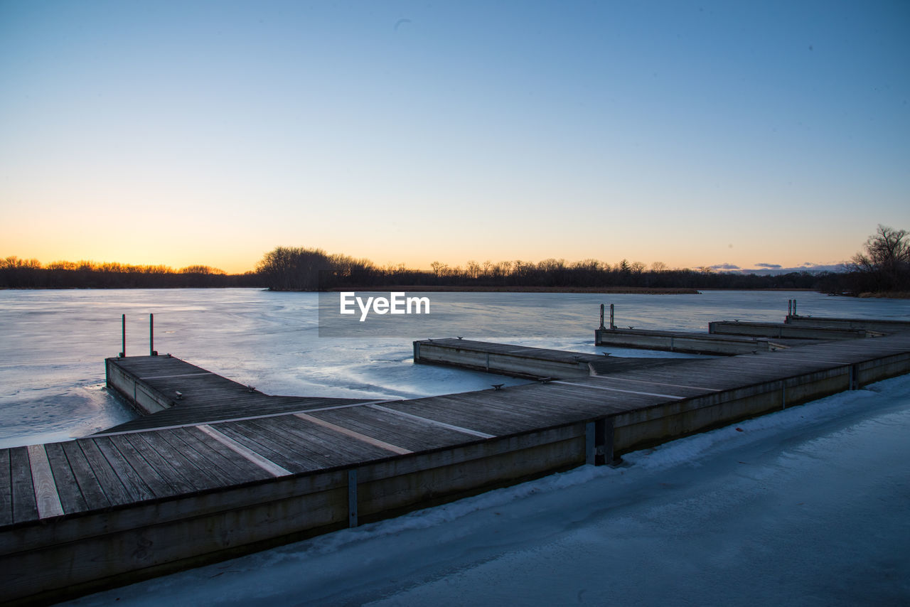 Scenic view of lake against clear sky