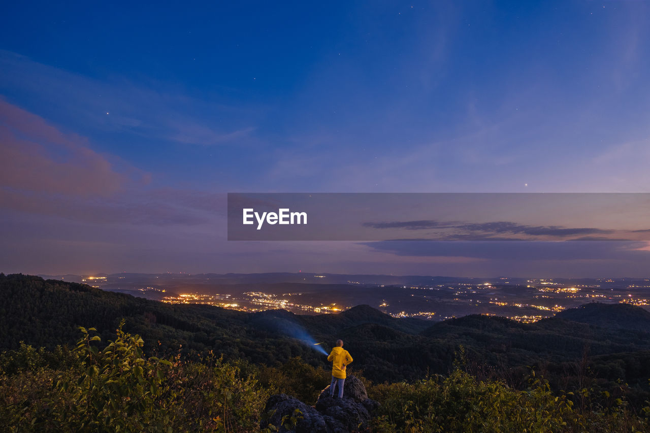 SCENIC VIEW OF LANDSCAPE AGAINST SKY AT SUNSET