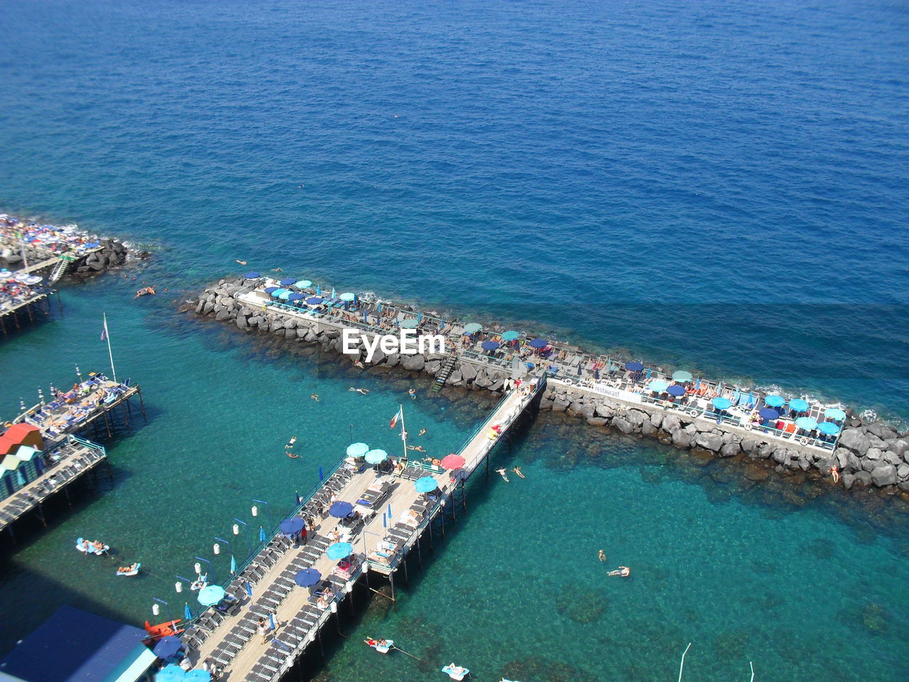 High angle view of sailboats at harbor