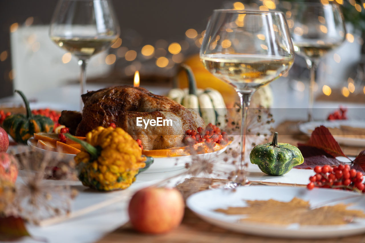 Traditional festive dinner with delicious roasted turkey served on table