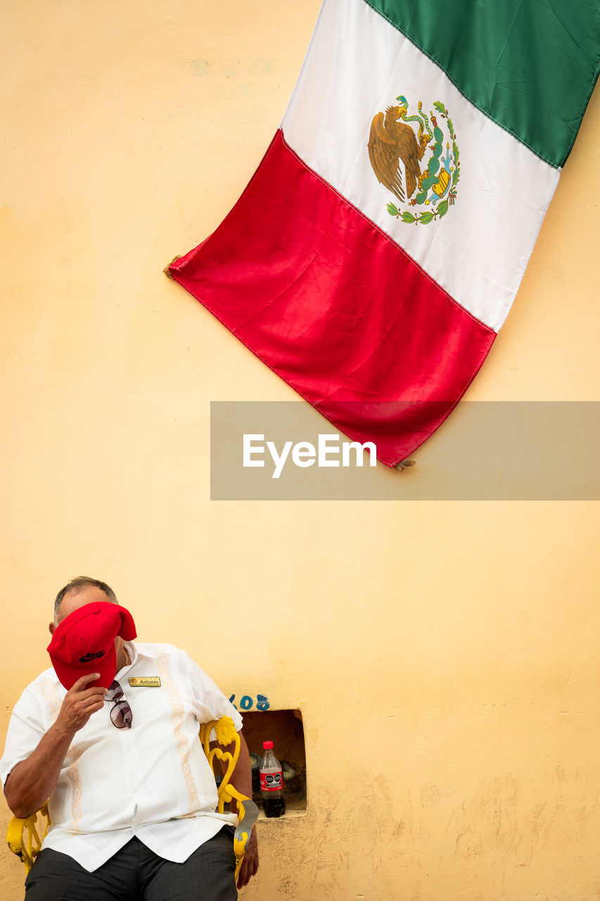 High angle view of man holding american flag