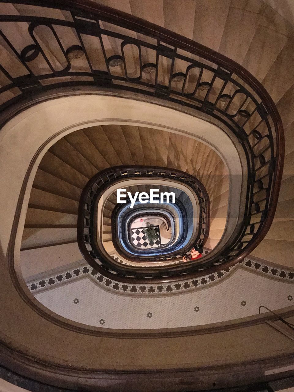 DIRECTLY BELOW SHOT OF SPIRAL STAIRCASE