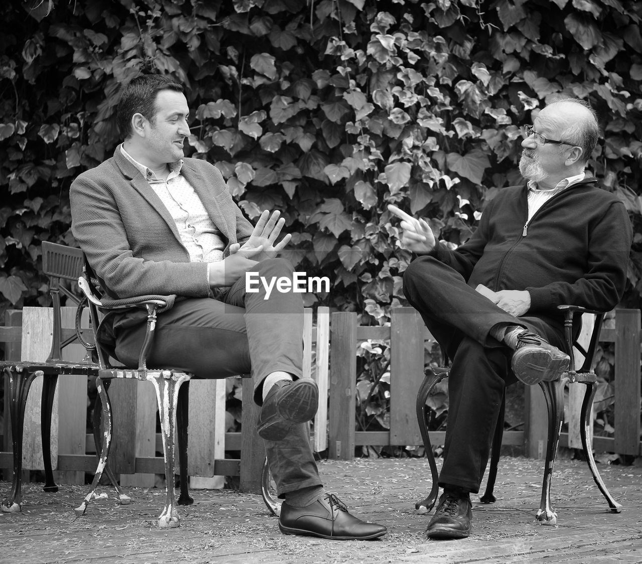 Men sitting in park