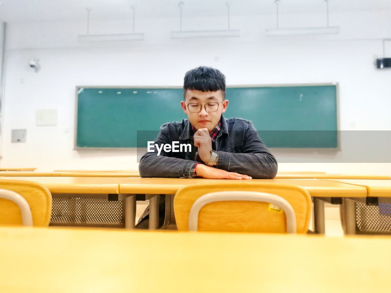 Man sleeping in classroom