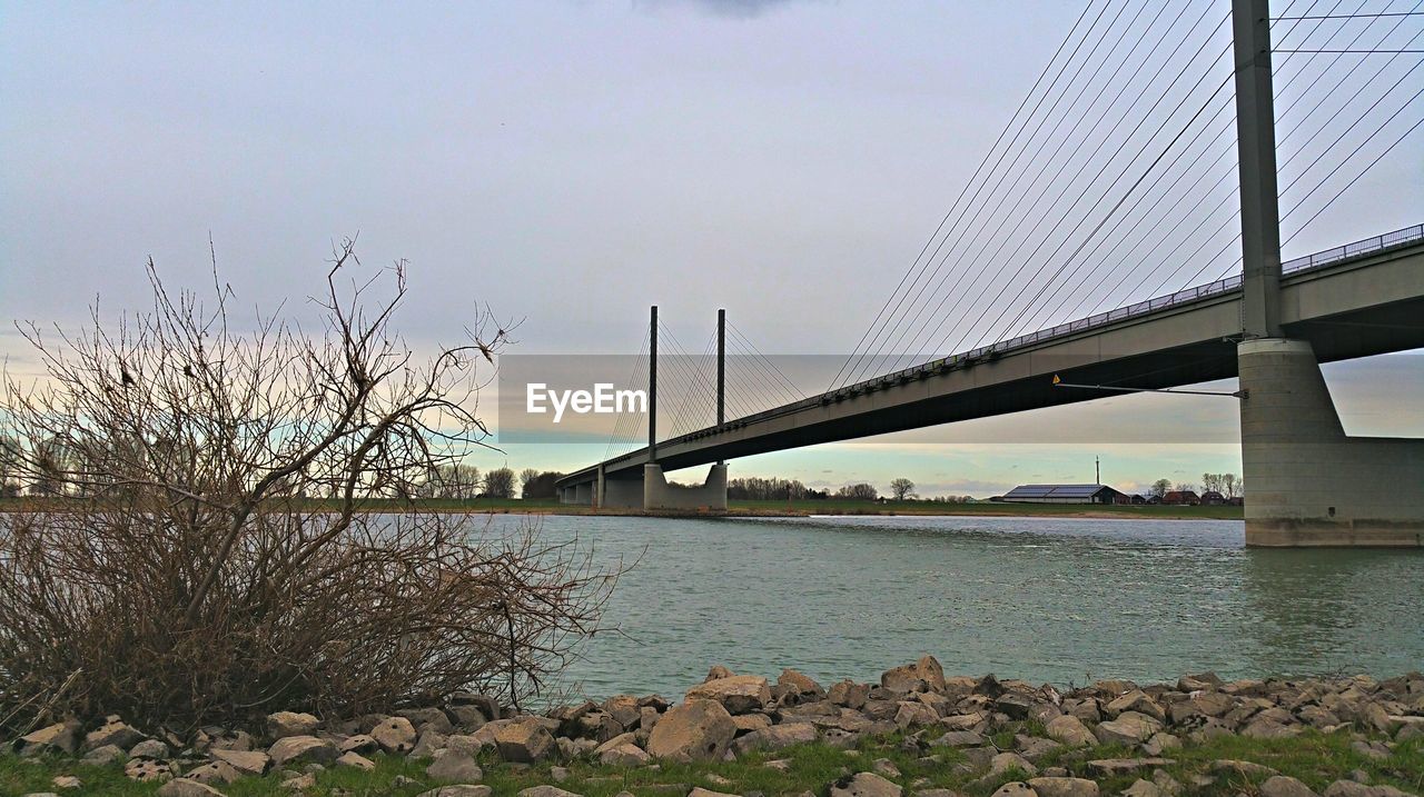 VIEW OF BRIDGE OVER RIVER