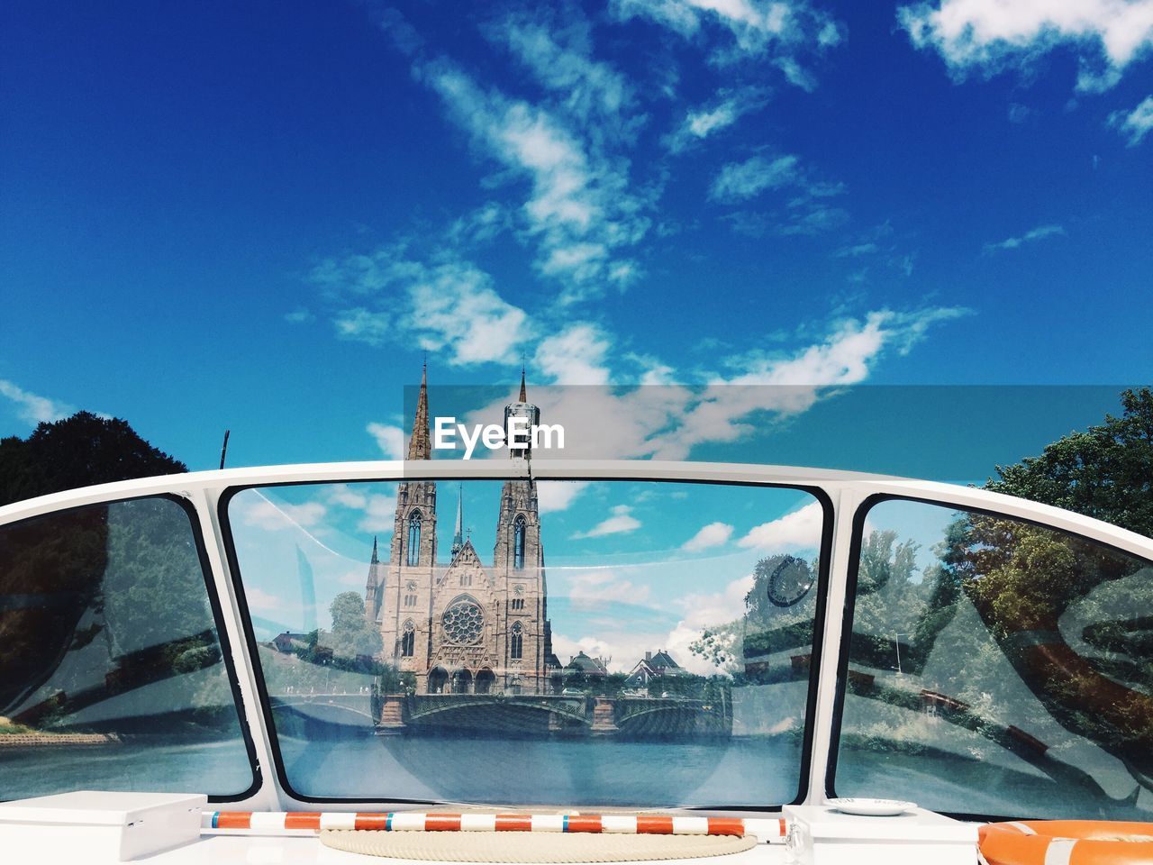 Cathedral against sky seen through boat