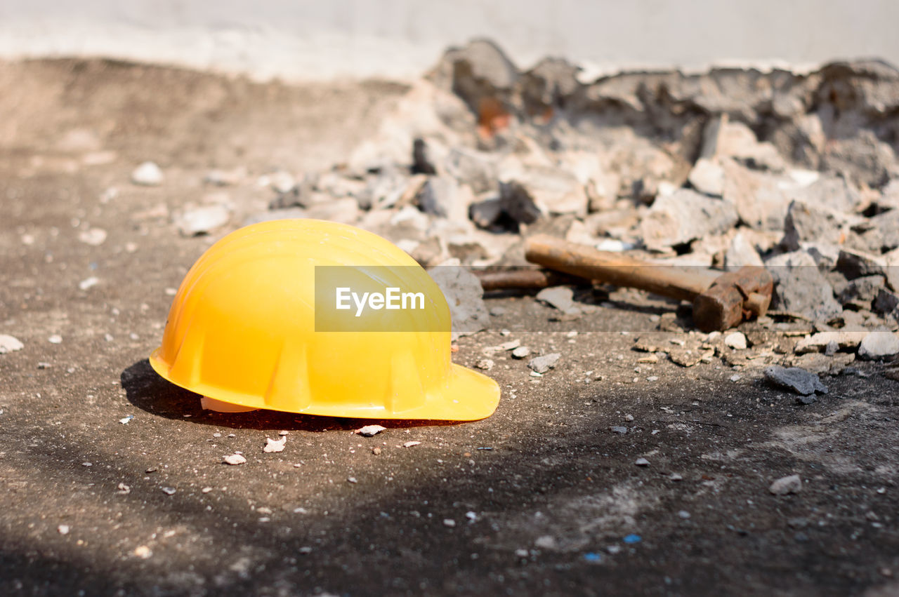 construction industry, hard hat, helmet, headwear, industry, construction site, yellow, protection, occupation, working, road construction, construction worker, hat, manual worker, security, work helmet, protective workwear, road, business, engineering, development, outdoors