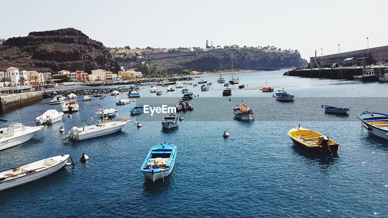 High angle view of boats moored in harbor