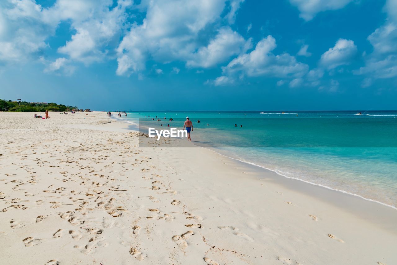 Scenic view of sea against cloudy sky