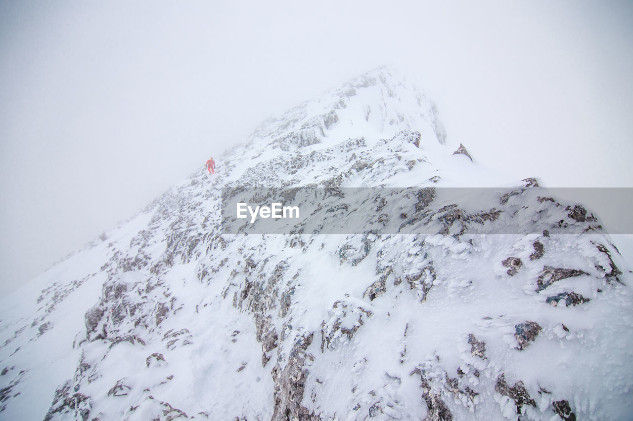 Low angle view of snow covered watzmann