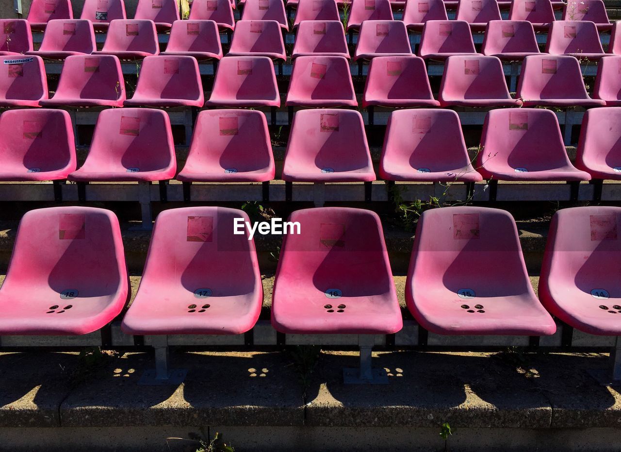 Empty seats of bleachers in stadium