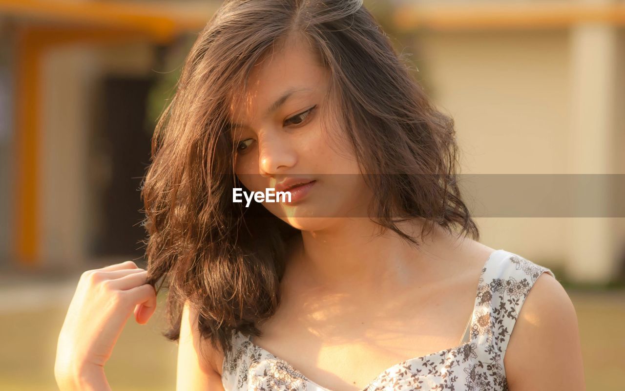 Close-up of thoughtful teenage girl