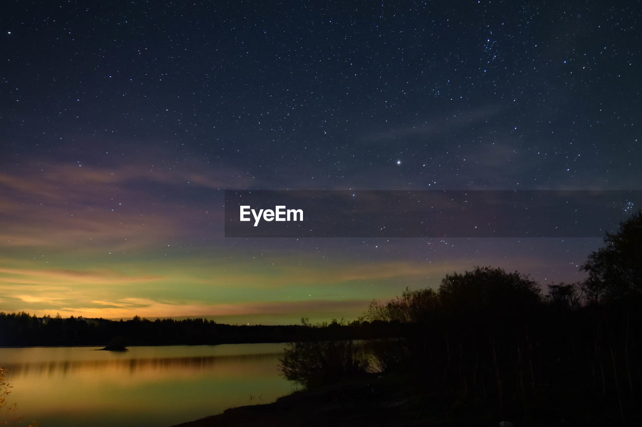 Scenic view of star field against sky at night