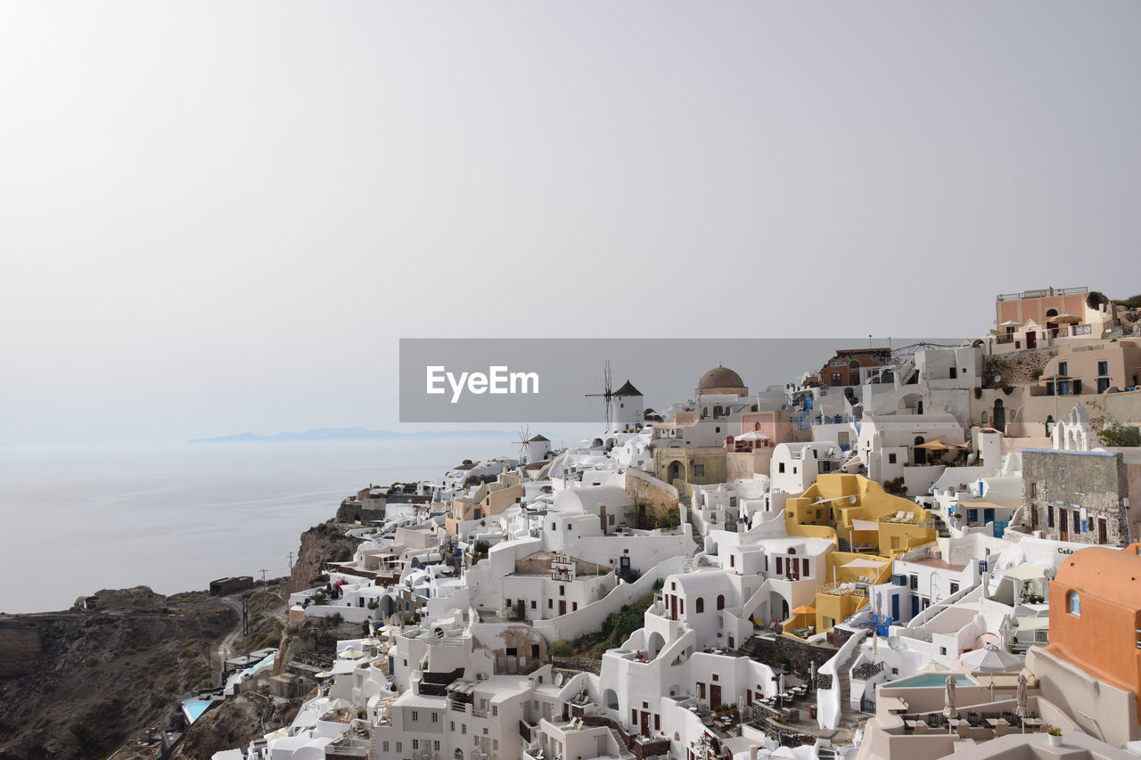 HIGH ANGLE SHOT OF TOWNSCAPE AGAINST CLEAR SKY