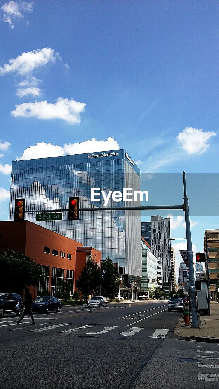 DIRECTLY BELOW SHOT OF MODERN BUILDINGS