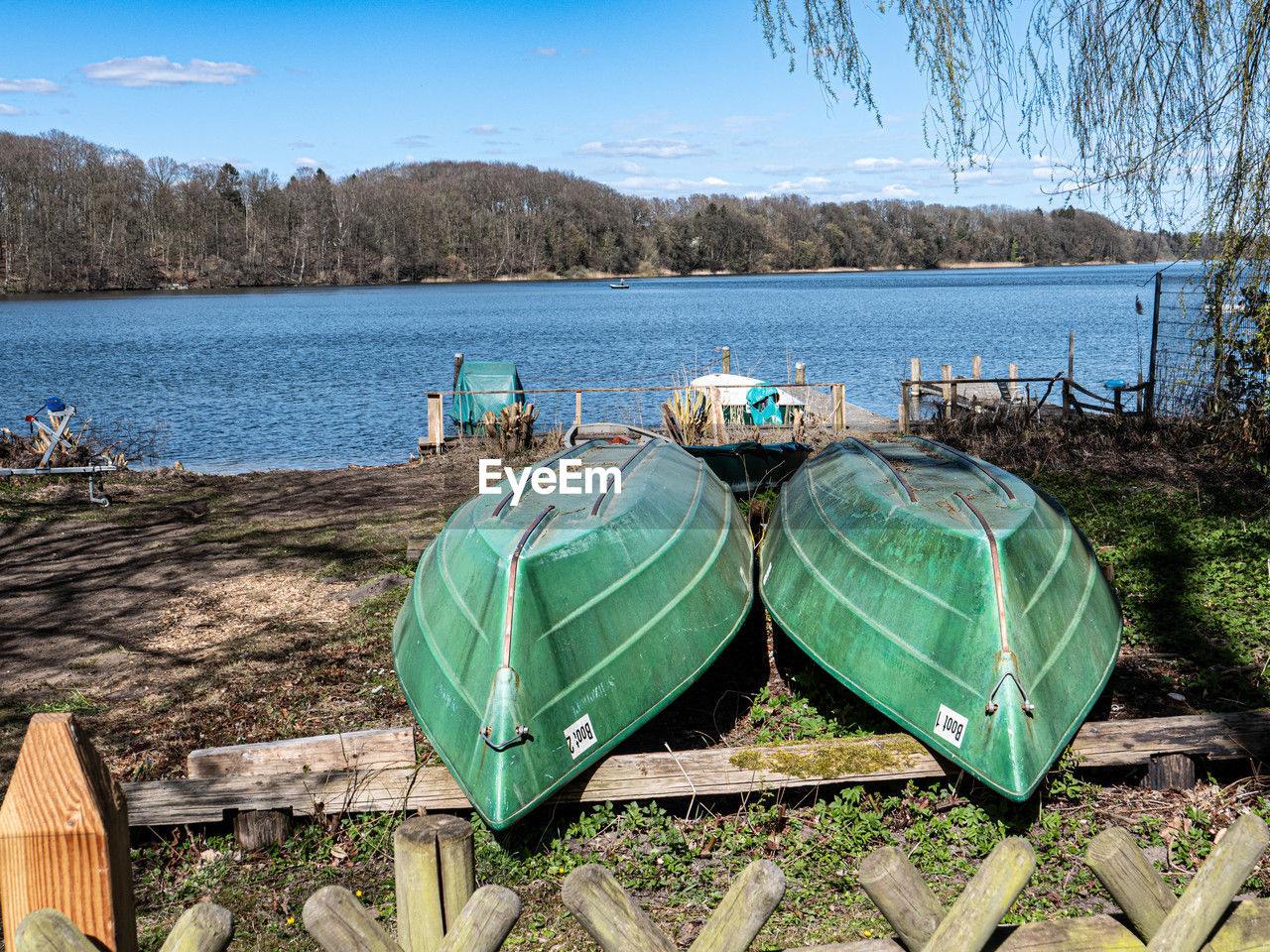 water, nature, sky, nautical vessel, land, day, lake, plant, beach, no people, transportation, scenics - nature, tree, tranquility, boat, vehicle, mountain, beauty in nature, outdoors, travel, tranquil scene, travel destinations, mode of transportation, environment, blue, clear sky, holiday, non-urban scene
